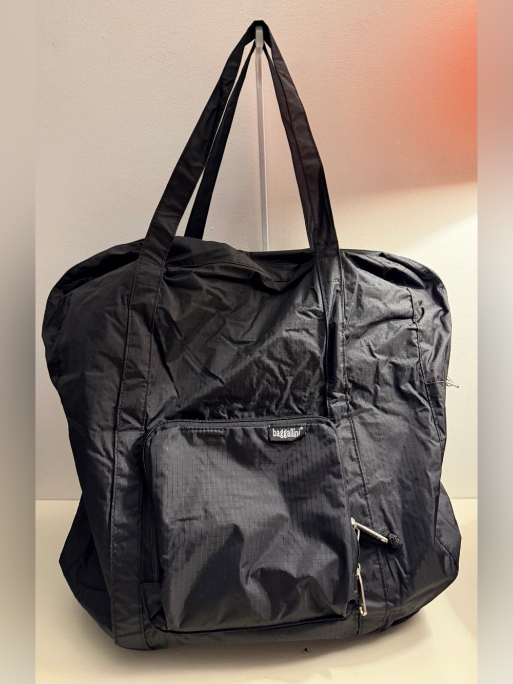 Baggallini black packable tote/shoulder bag.